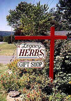 the sign Raymond designed & painted